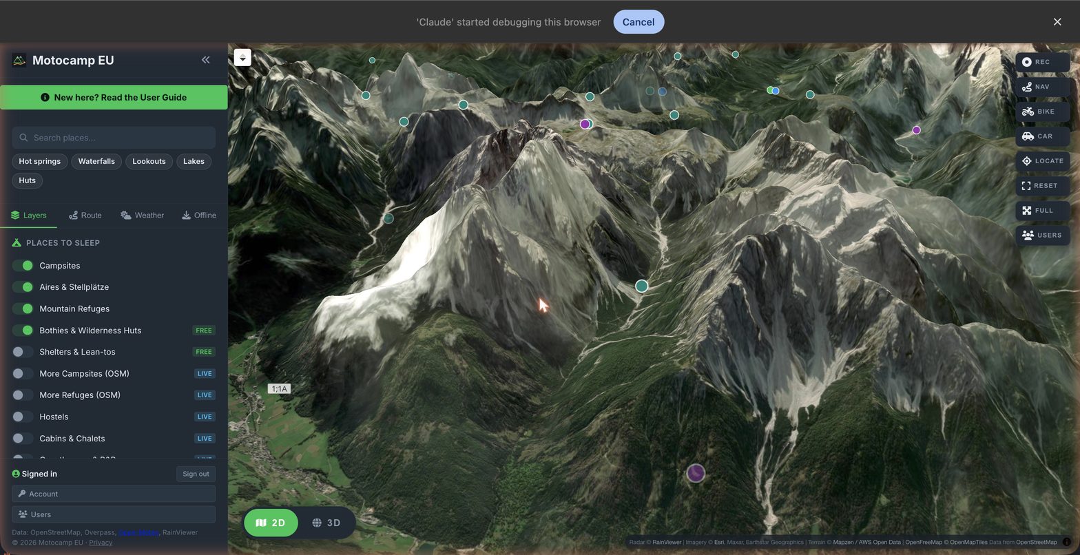 Motocamp EU showing the Dolomites in 3D satellite view: snow-streaked peaks rising in real relief, with campsite and mountain-refuge pins scattered across the range.